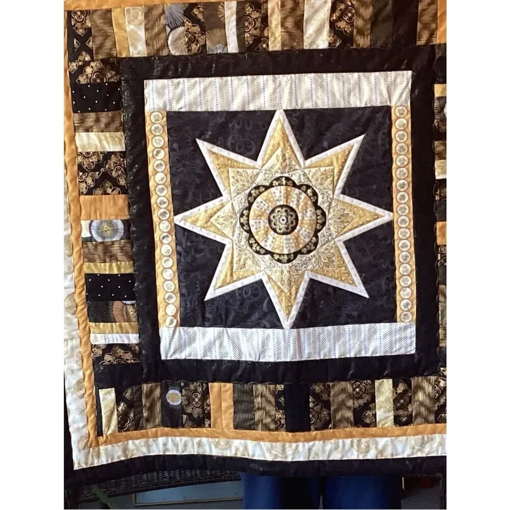 NWT. Gold and Black Star Lap Quilt